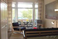 Wohnzimmer mit Balkon